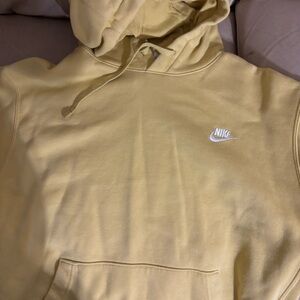 Light mustard yellow Nike jacket! I’ve only worn this once!